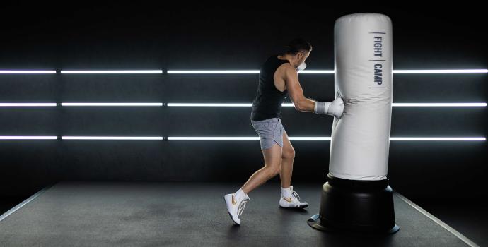 Tommy Duquette Throwing Punches On a Heavy Bag