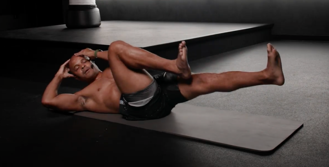 Flo Master Doing Bicycle Crunches