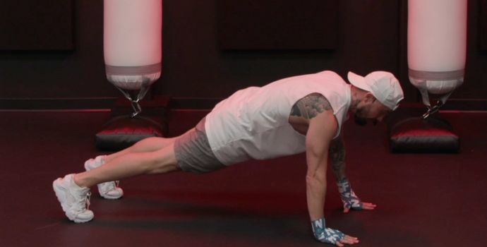 Aaron Swenson Holding a High Plank