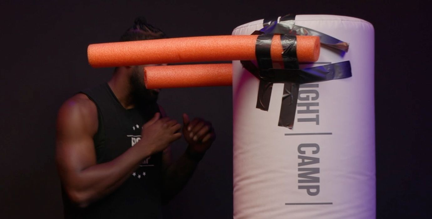 Coach PJ Doing a Roll Lead Boxing Movement