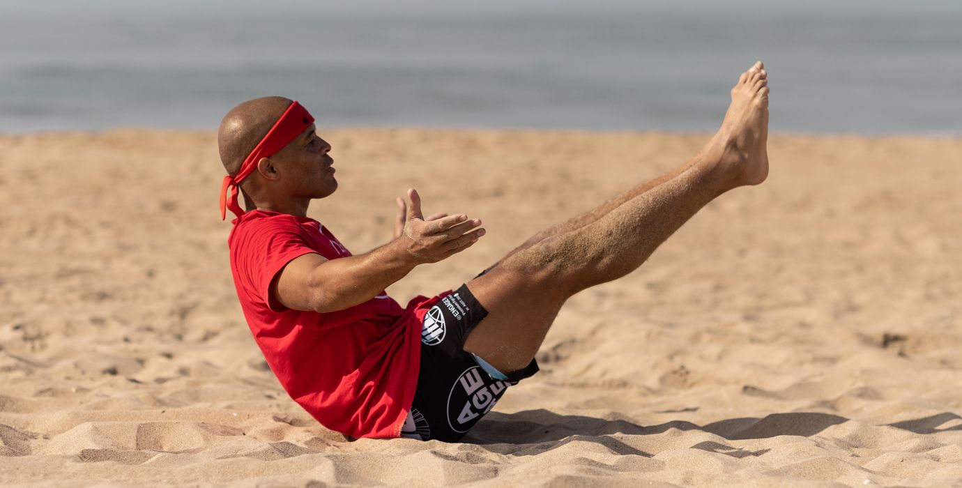 Flo Master Doing V-Up Holds