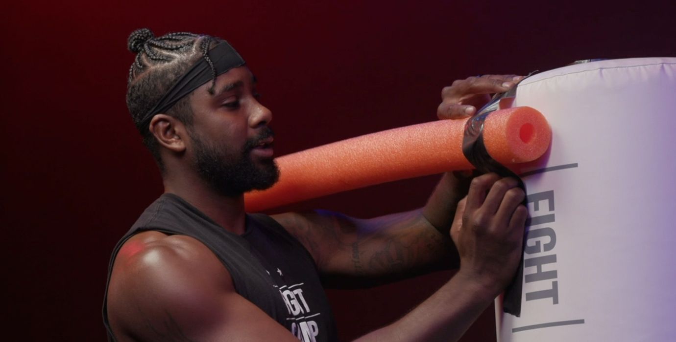 PJ Shirdan Attaching Pool Noodle To Boxing Heavy Bag