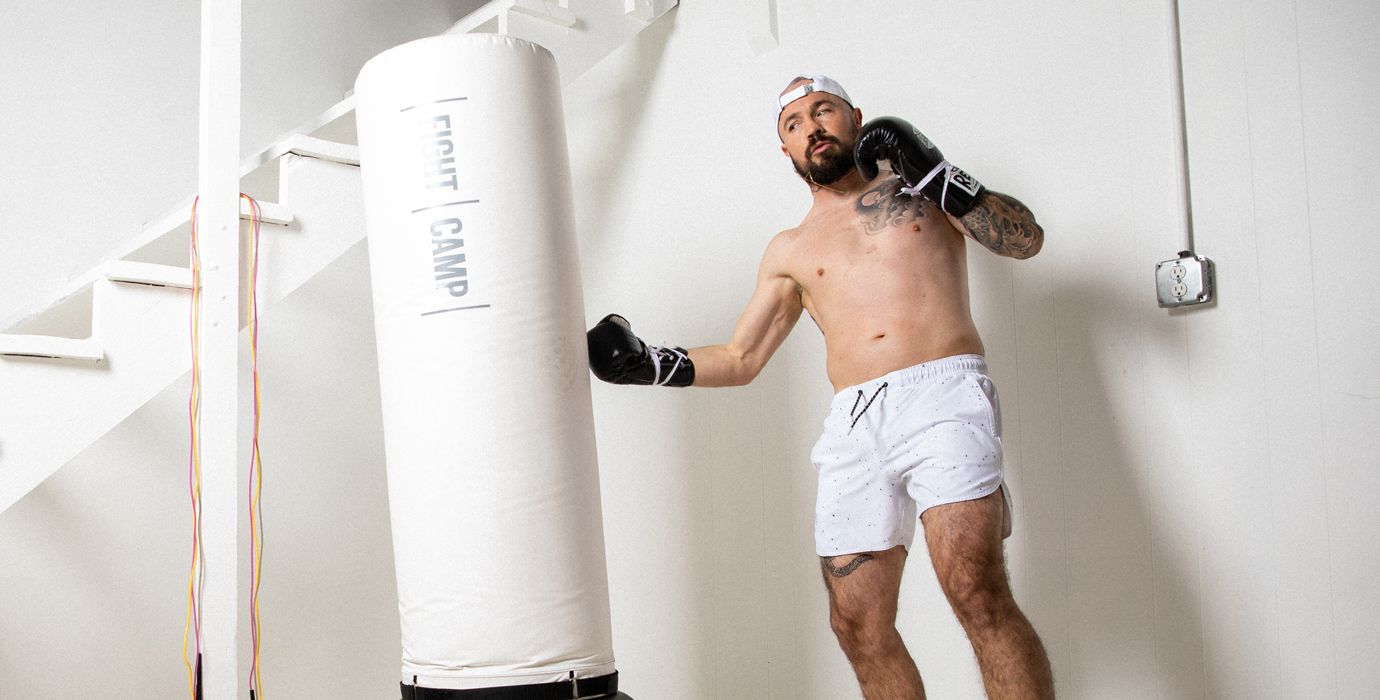 Aaron Swenson Hitting a Punching Bag