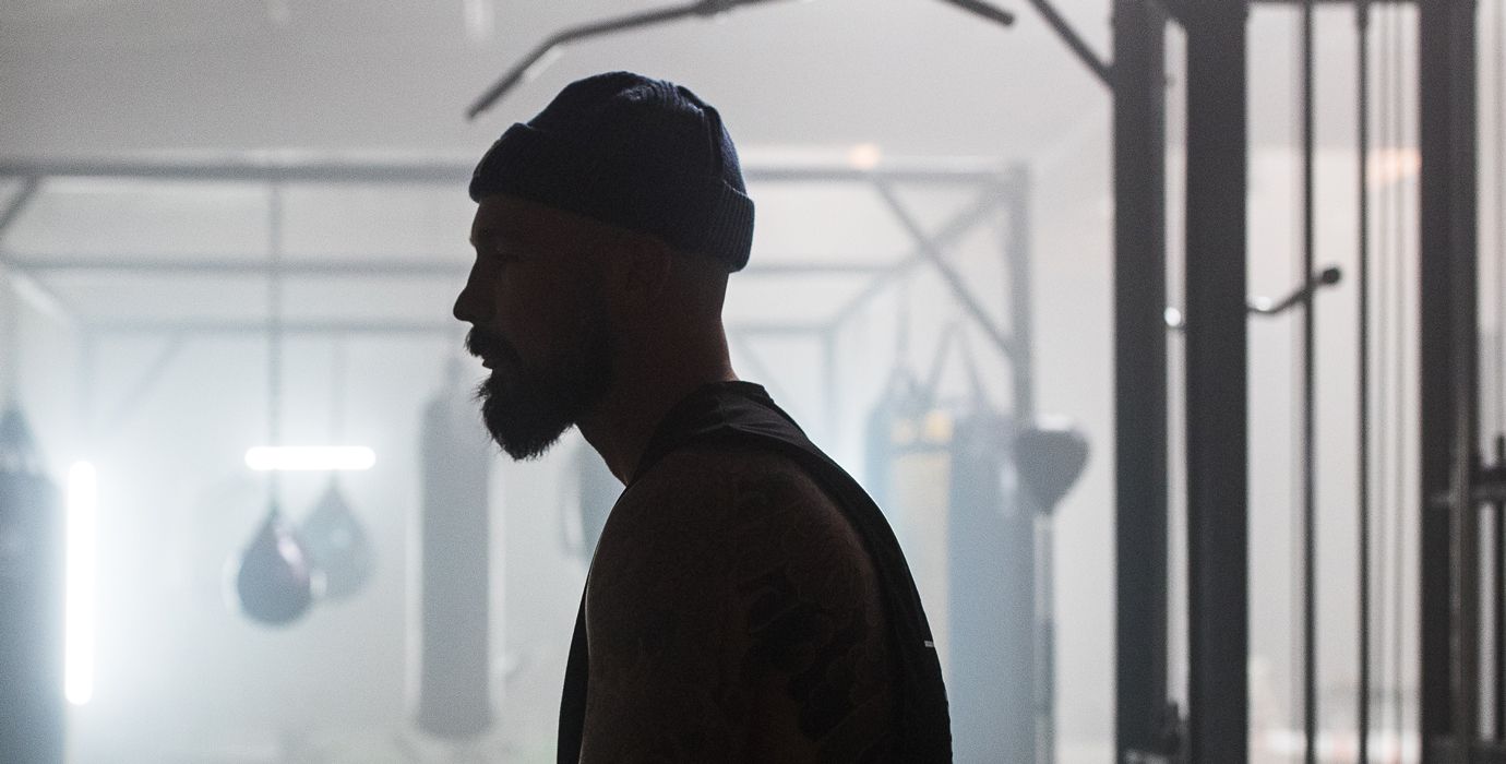 Aaron Swenson Sitting In Boxing Gym