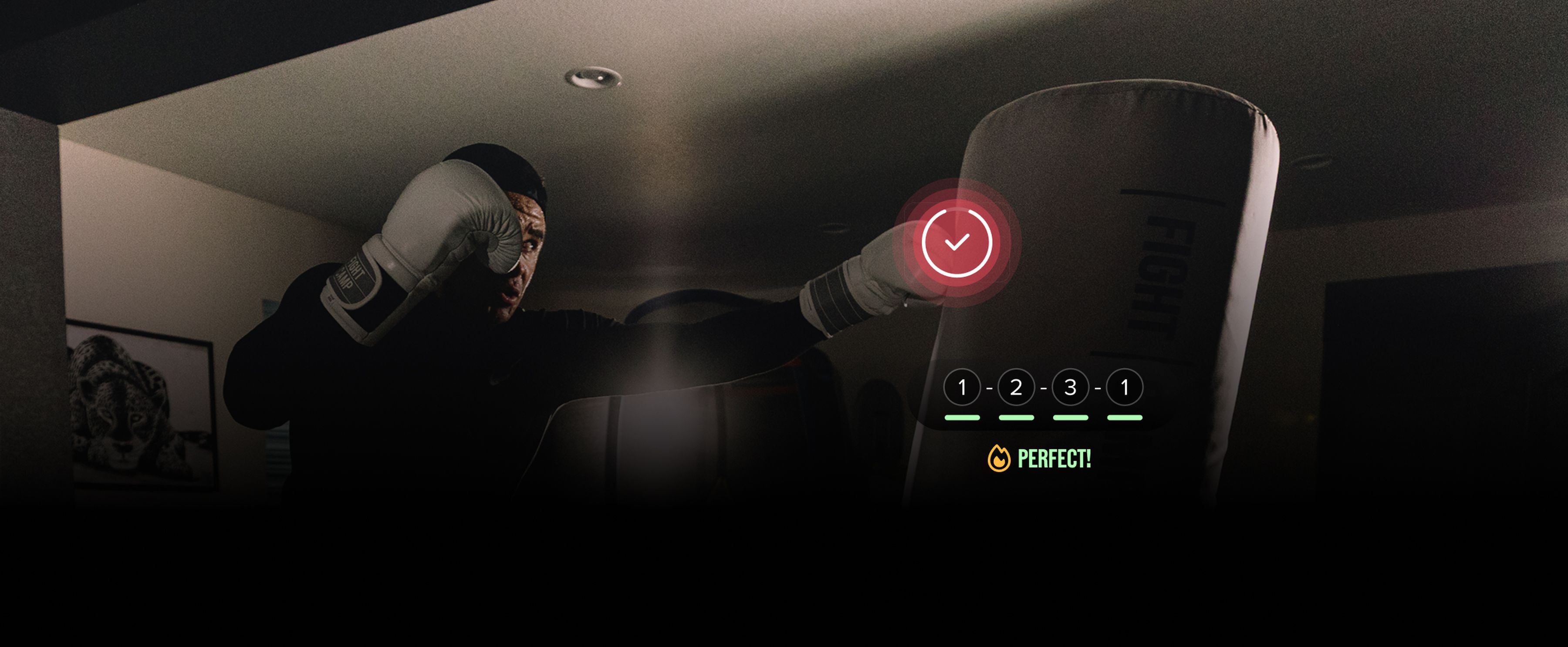 Person in boxing gloves punching a target with a digital score display showing "Perfect!" under numbered steps, in a dimly lit room.