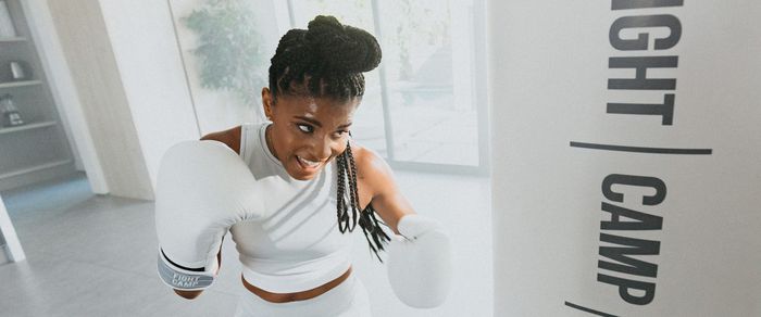 FightCamp - Woman Burning Calories Boxing