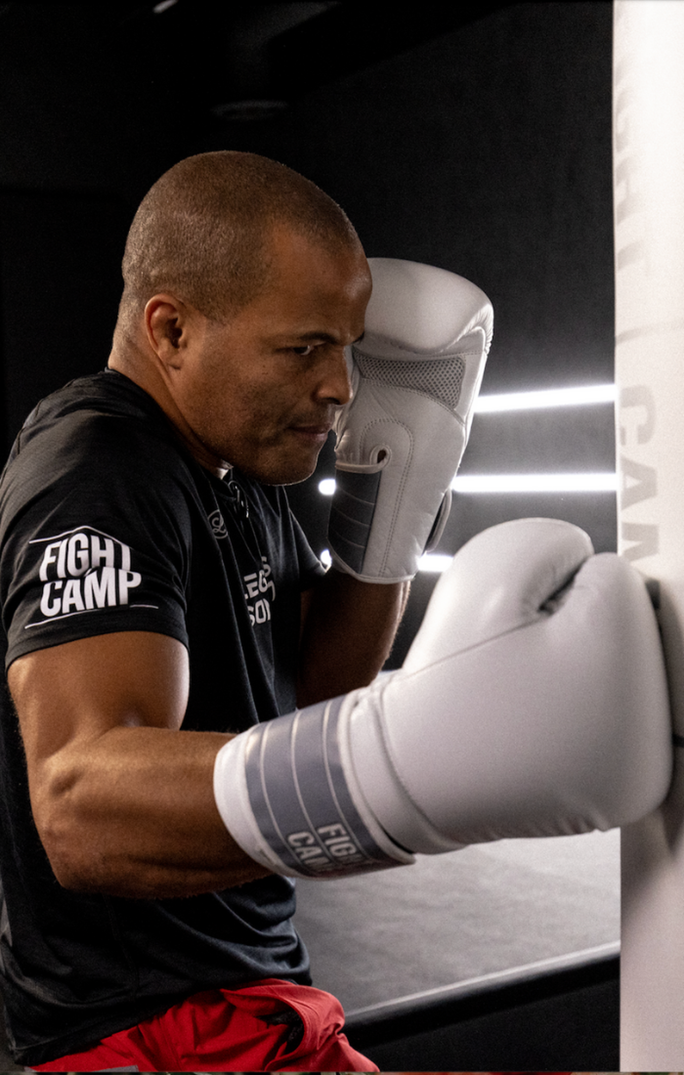 Flo Master Punching a Heavy Bag