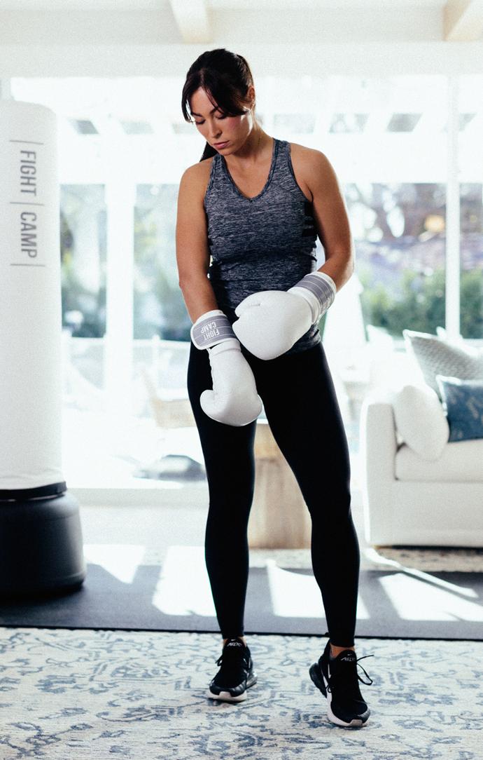 Boxer Putting On Boxing Gloves