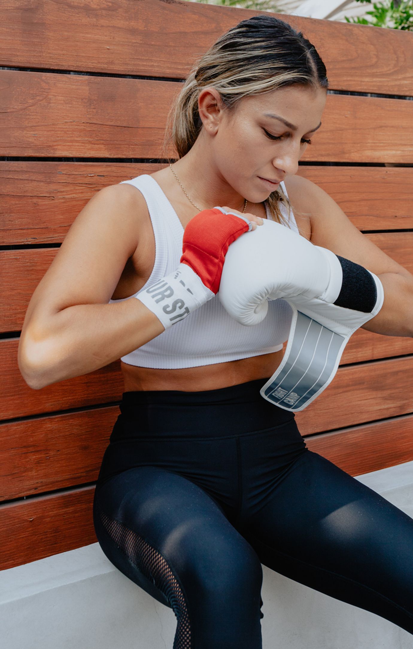 Boxer Putting On Boxing Gloves