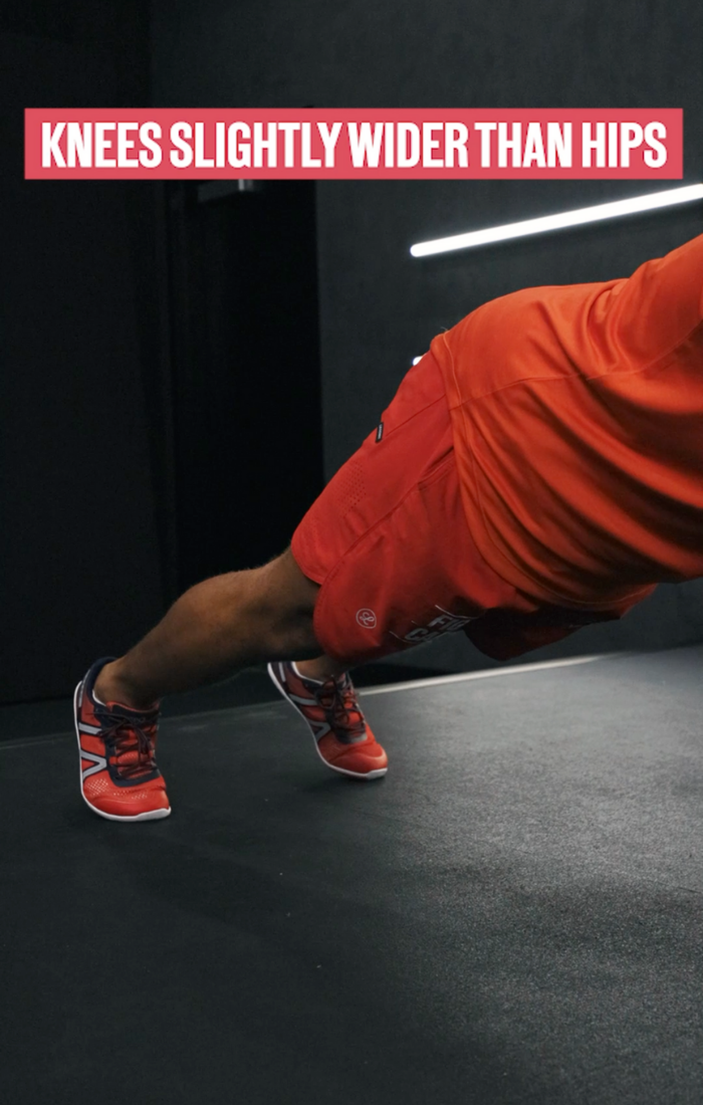 Knees slightly wider than hips