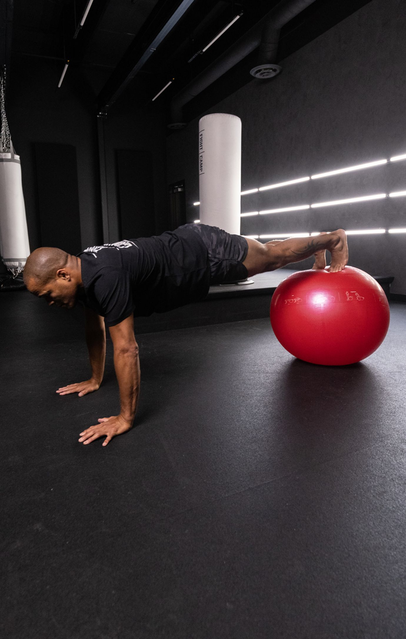 Flo Master Doing a Stability Ball Walk Out