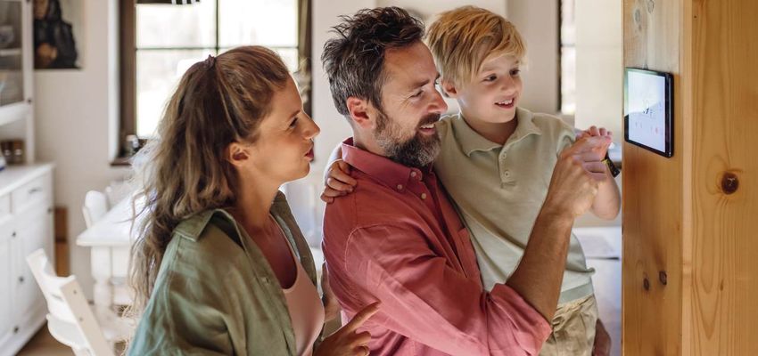 A young family in a home using energy.