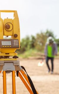 Land surveyor on the job
