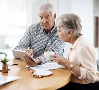 Couple looking at trust loan documents