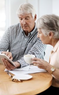 Couple looking at trust loan documents
