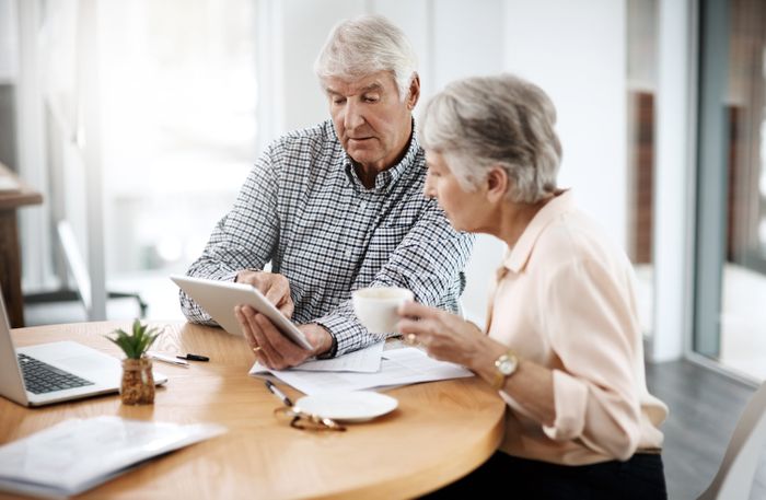 Couple looking at trust loan documents
