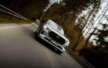 Mazda CX-60 electric car on road