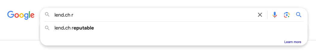 Close-up of a Google search box and the automatic search suggestion ‘lend.ch reputable’.