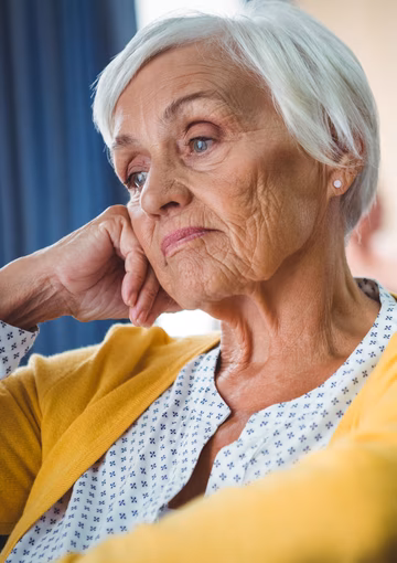 Senior woman looking complexed 