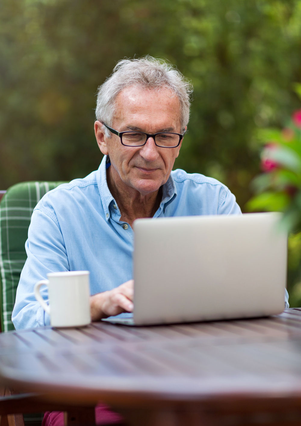 Senior man on computer