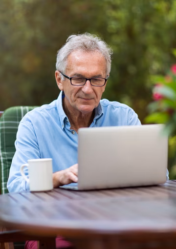 Senior man on computer
