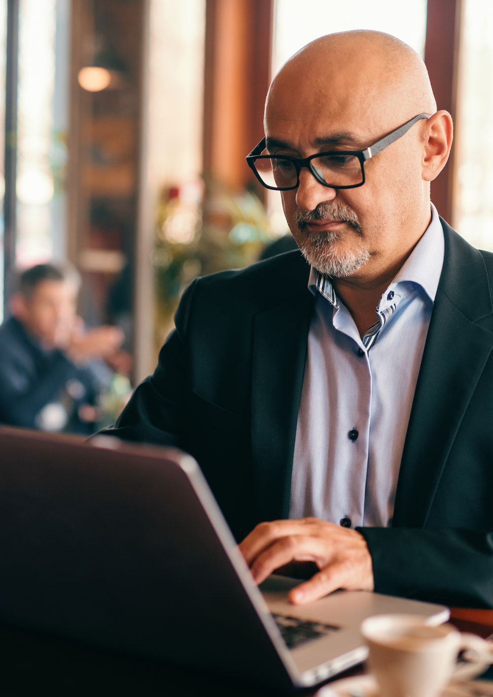 Senior man using laptop