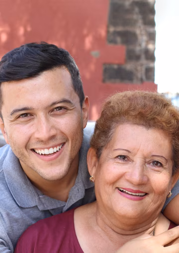 Senior mother and adult son carer