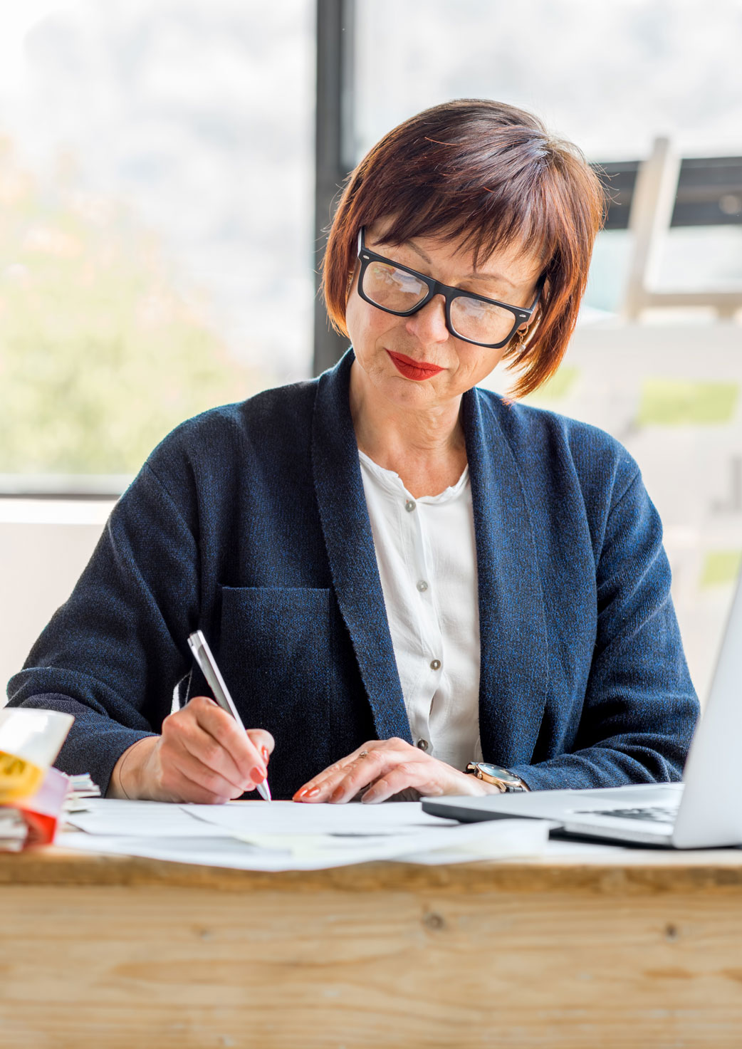 Senior woman doing her finances 