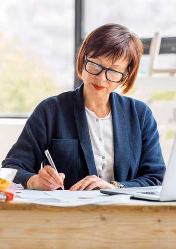Senior woman doing her finances 