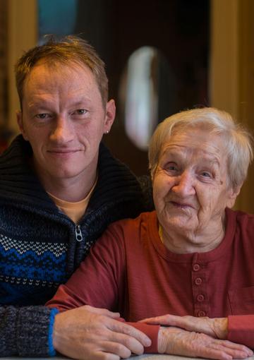 Senior mother and adult son