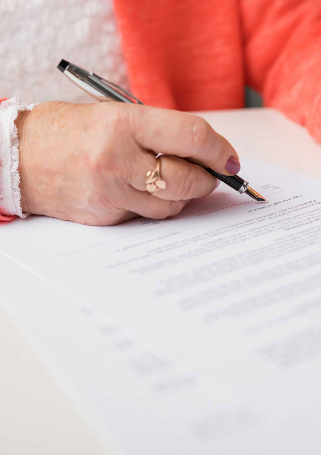 Senior woman filling out form