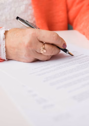 Senior woman filling out form