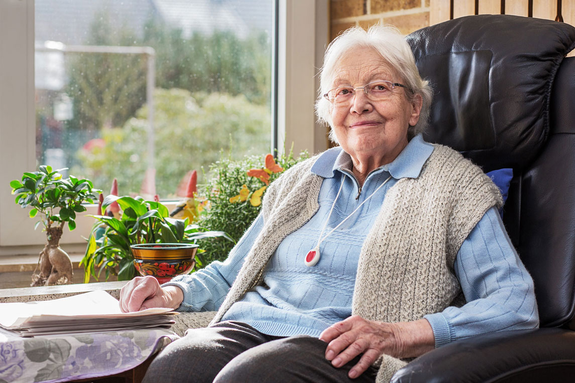 Senior woman sitting in chair