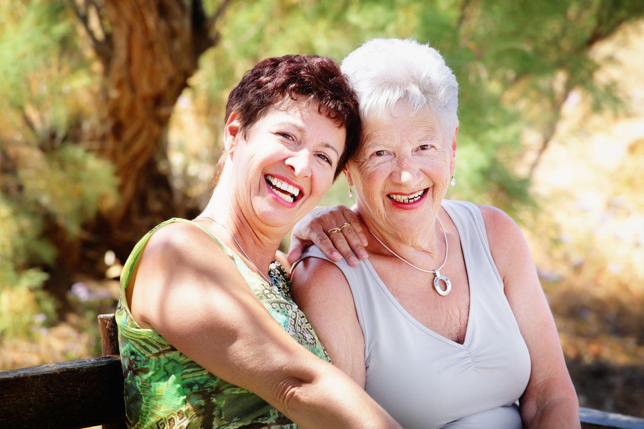 Two senior women smiling 