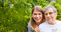 Image of a young woman and an older woman, who might be her grandmother