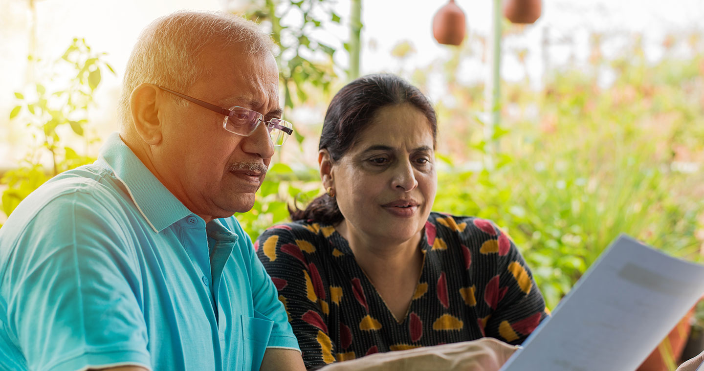 Older couple looking at paperwork together
