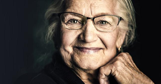 Image of an older woman wearing glasses
