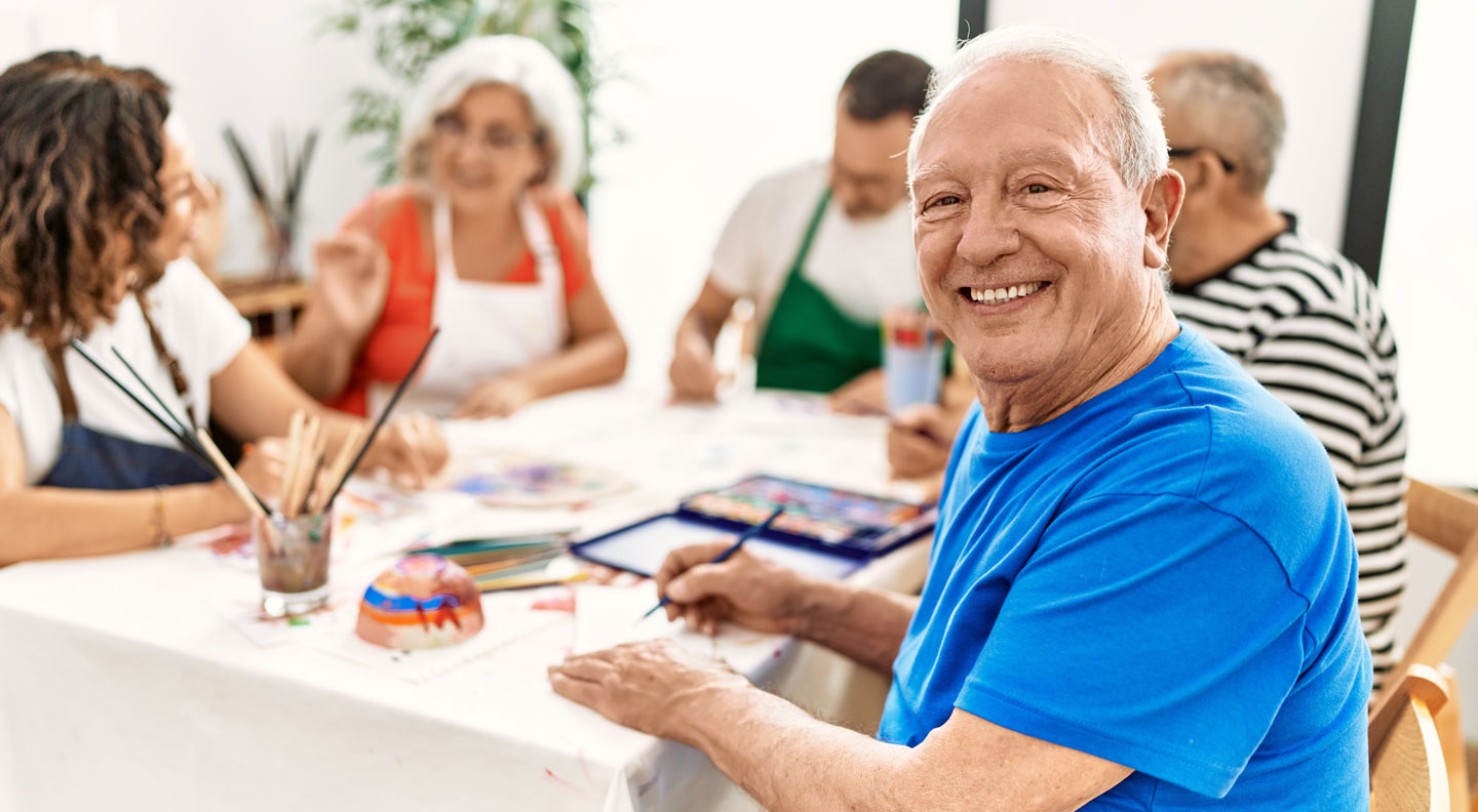 group of seniors at craft table 