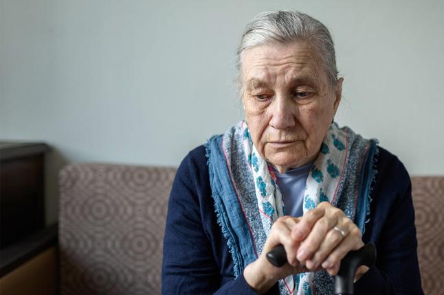 Photo of a sad woman with a pretty scarf