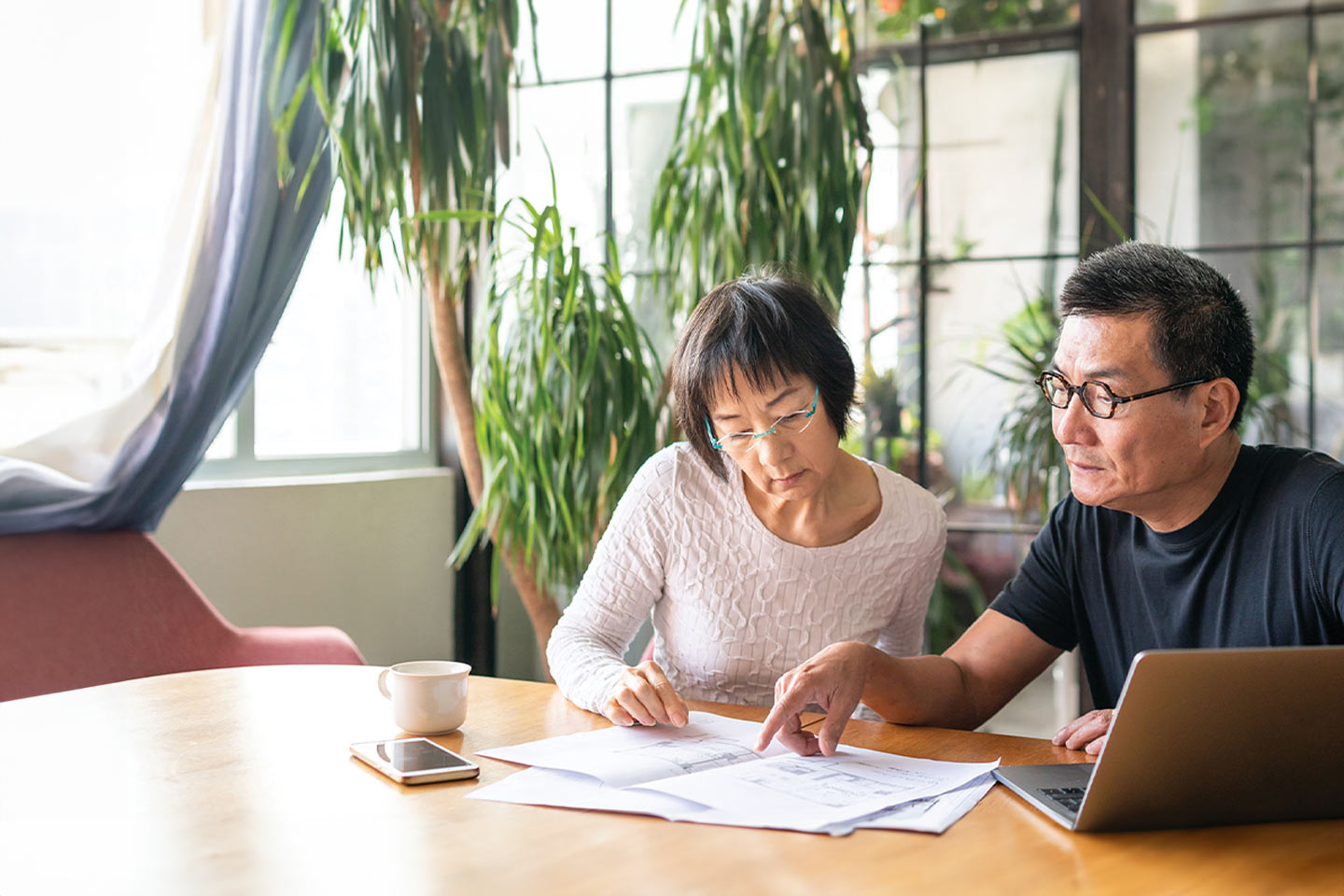 Photo of couple doing paperwork