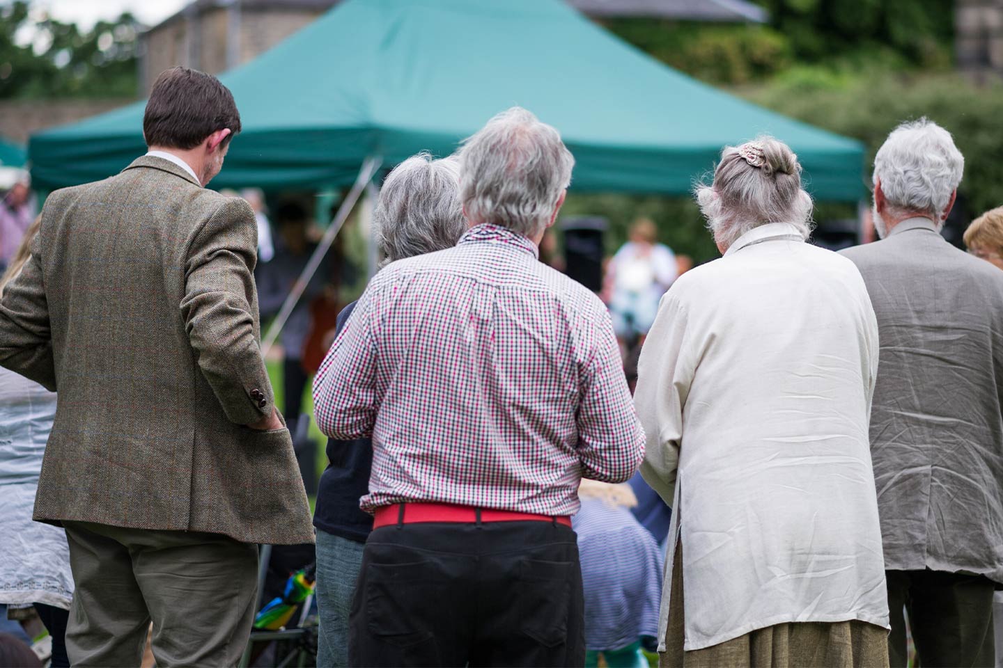 Photo of people at an outdoor fair