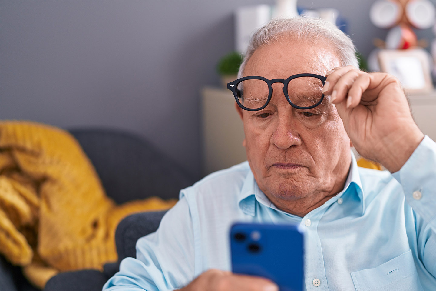 Photo of man looking at his phone