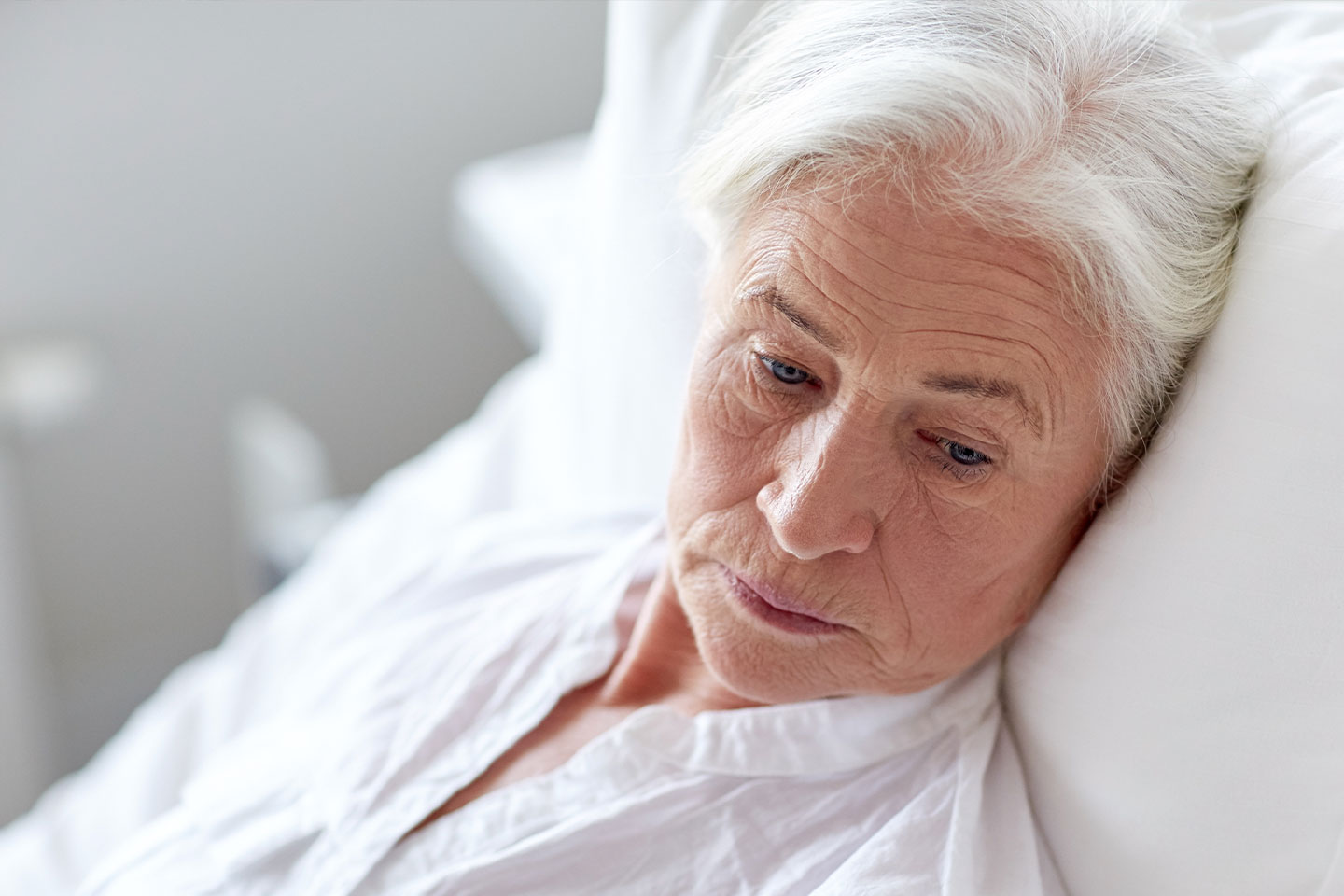 Photo of a women with white hair and white shirt