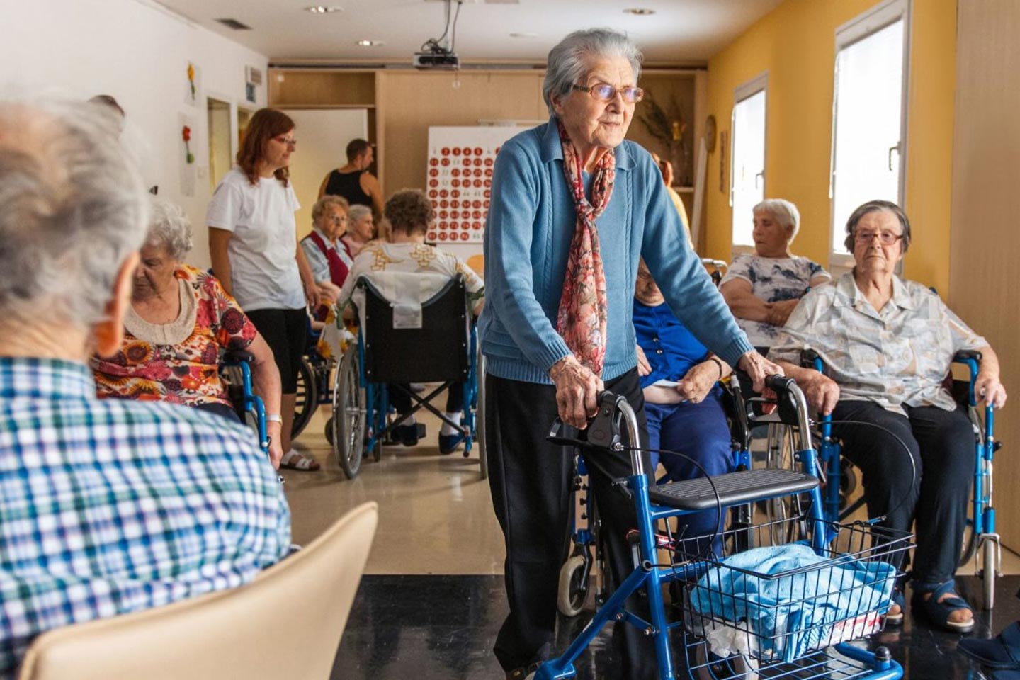 Photo of a group with wheelchairs and walkers