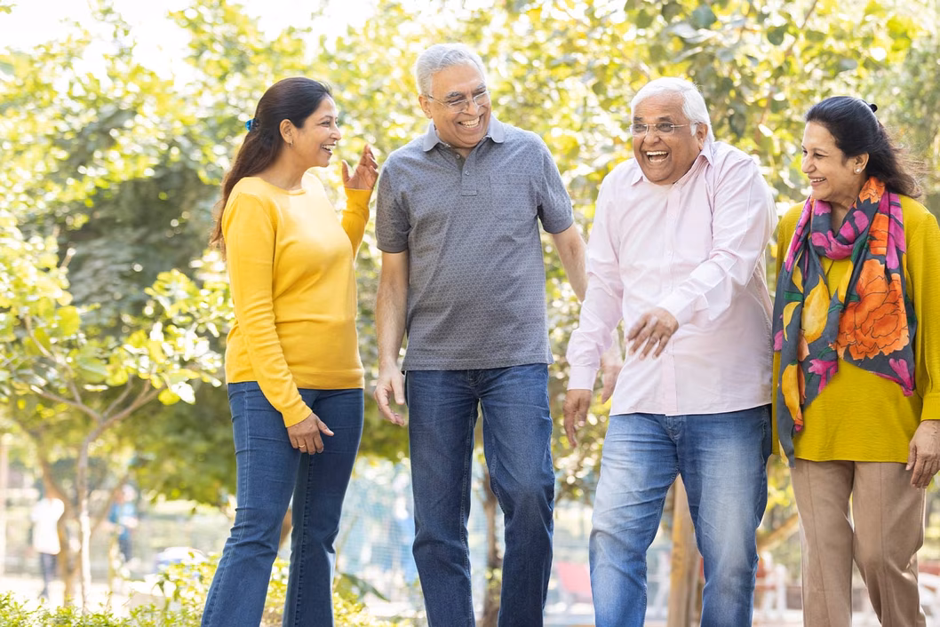 Photo of a group of four people walking in nature