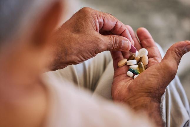 Photo of a handful of medications