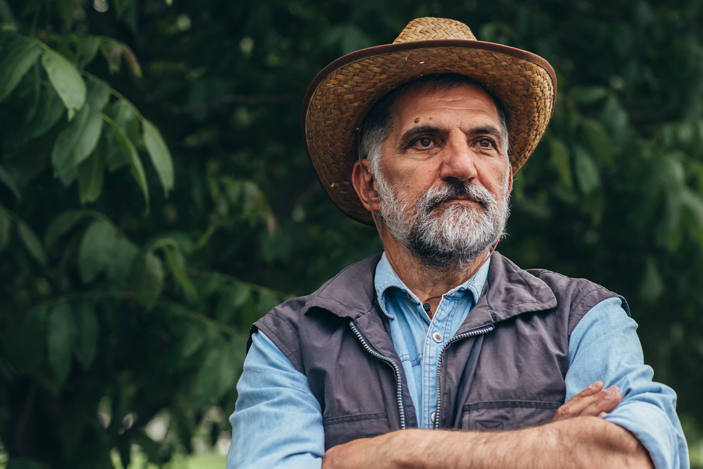 Image of an older man wearing a hat
