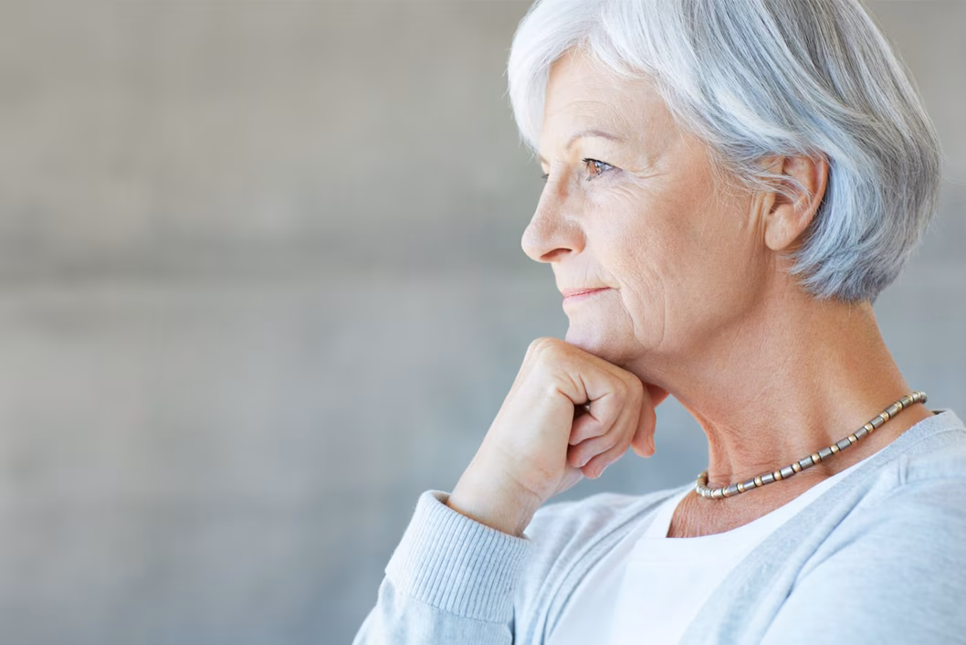 Photo of woman looking pensive