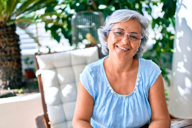 Senior woman sitting outside 