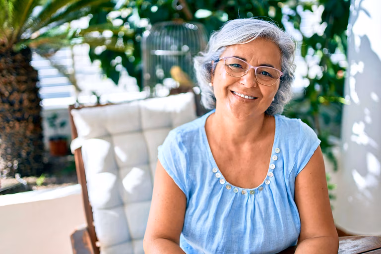 Senior woman sitting outside 
